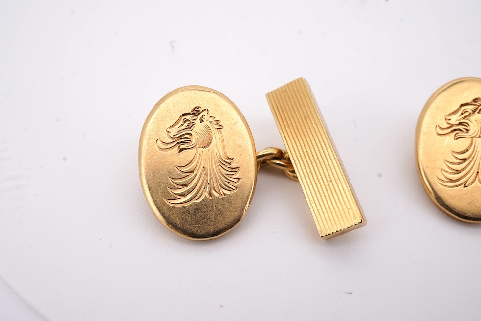 A pair of Elizabeth II 18ct gold oval cufflinks, engraved with lion's head crest, S.J. Rose & Son, Birmingham, 1973, 22 grams. Condition - fair
